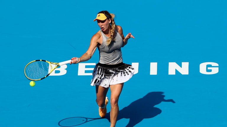 Defending champion
Wozniacki regains
form in Beijing