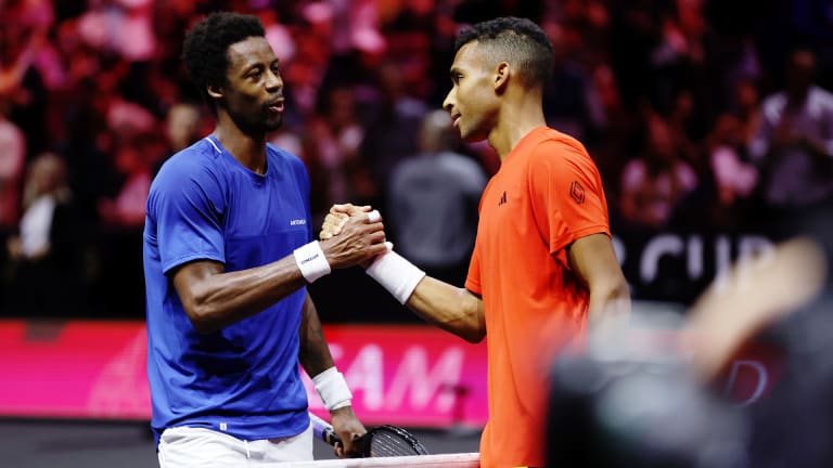 Monfils and Auger-Aliassime shake hands at the net after their tense discussion at Laver Cup.