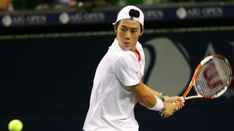 During Day 1 of the AIG Japan Open Tennis Championships, Kei Nishikori returns a shot against Zack Fleishman.