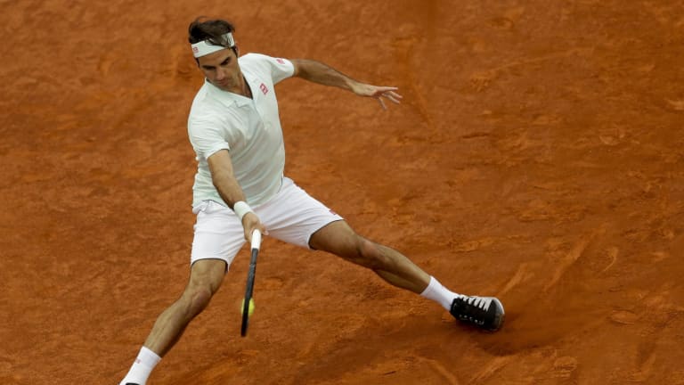 In Madrid, Federer slides past Gasquet in clay-court return