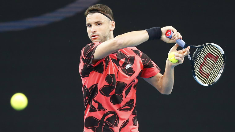 Dimitrov makes a 
tracksuit statement
in Melbourne
