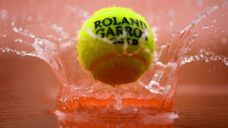 Balls not for dogs, weather for ducks: Soggy start for French Open