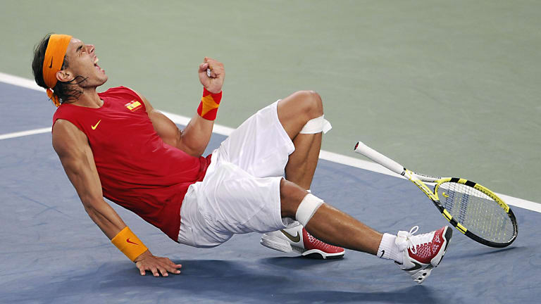 It couldn't be a Rafa Fashion Rewind without him wearing his country’s colors: At the 2008 Olympics in Beijing, he represented Spain with this patriotic tee and offset headband.