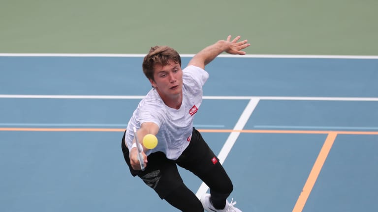 Collin Shick stretches for volley against Alex Neumann during the PPA San Clemente in June.
