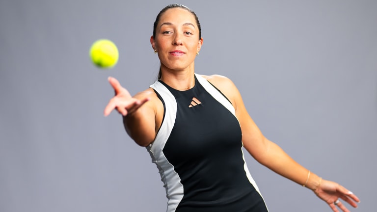 Jessica Pegula tosses a ball during a promotional photoshoot—on any given week, it could be manufactured by Penn, Dunlop, Wilson, Head, and more.