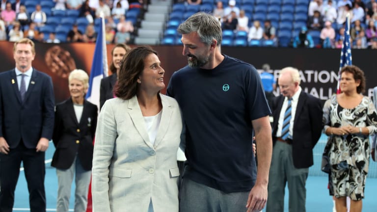 HOF enshrinement partners Martinez and Ivanisevic won in doubles, too