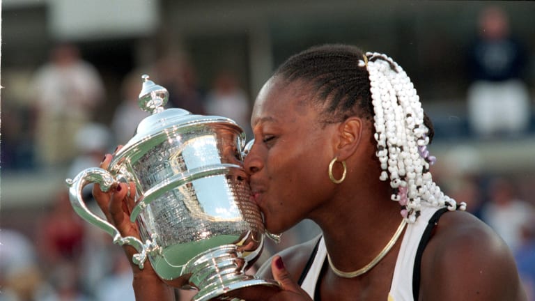 Serena Williams, arguably the greatest woman tennis player in history says luck has nothing to do with her success. She kisses her trophy after winning a match during the 1999 US Open.