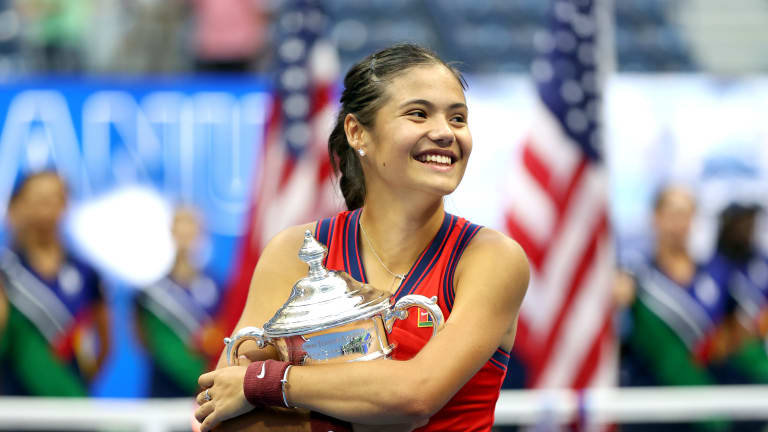 Raducanu holds the 2021 US Open trophy in Flushing Meadows