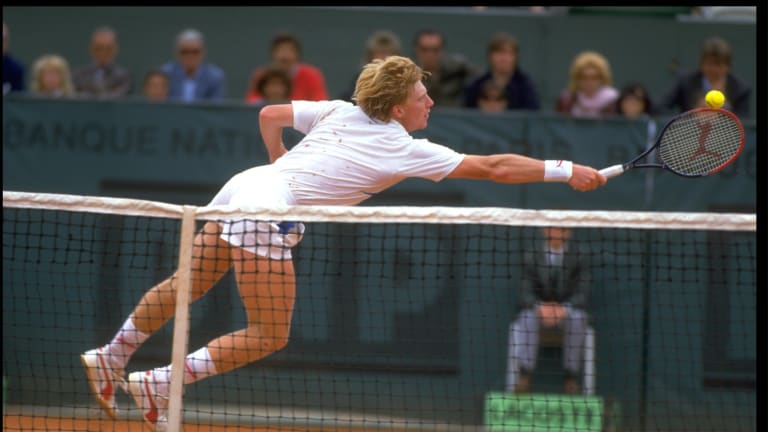 A young Boris Becker dives to return a shot during a match at the 1987 French Open.