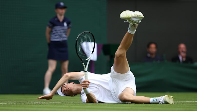 Jannik Sinner didn't make much of his tumble on the turf, saying first-round matches at Wimbledon are “always a bit more slippery.”