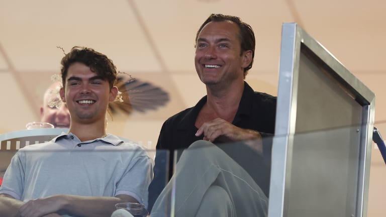 Law and his son watched Sabalenka cruise into the semifinals.