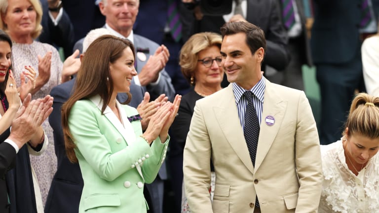 Roger Federer, seated next to Catherine, Princess of Wales, in the Royal Box on Wimbledon's Centre Court.