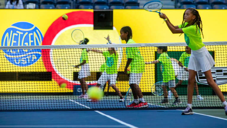 Children playing tennis on Arthur Ashe Stadium to promote tennis for young boys and girls during the US Open Tennis Championship 2022