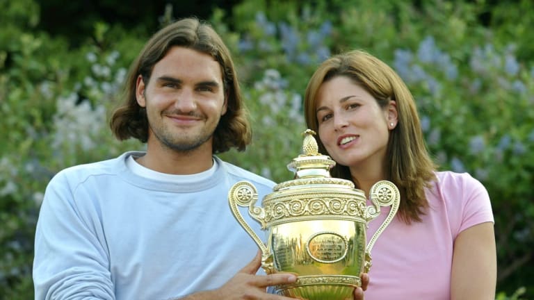 2003, Wimbledon: Posing with Roger's first major trophy.