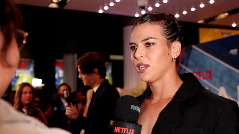 Ajla Tomljanovic answers journalists' questions on the red carpet.