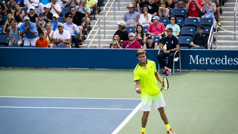 Photo of the Day:
Harrison upsets
Raonic on Grandstand