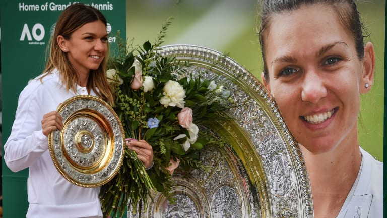 Wimbledon champion
Simona Halep returns
home