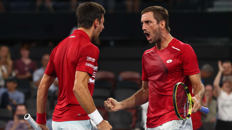 Djokovic takes 
undefeated streak
to ATP Cup semis