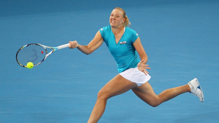 Kaia Kanepi plays a forehand in her quarter final match against Andrea Petkovic during day five of the 2012 Brisbane International at Pat Rafter Arena