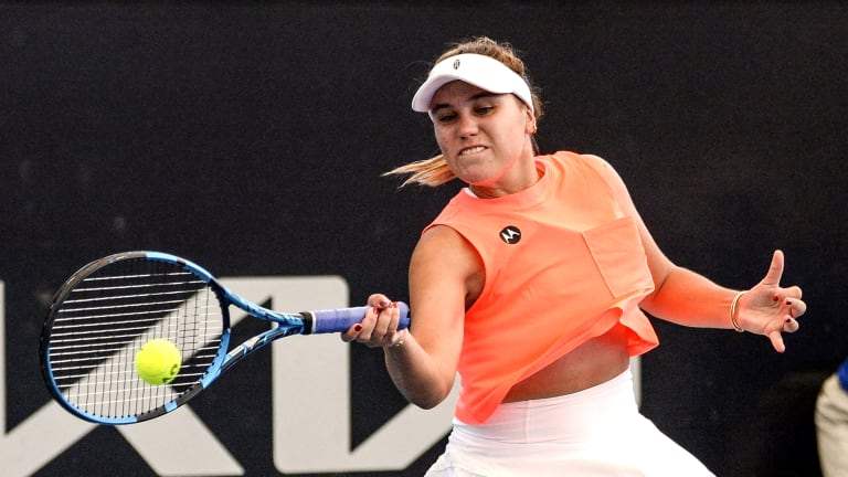 Sofia Kenin, in action for the first time in six months, strikes a forehand in Adelaide.