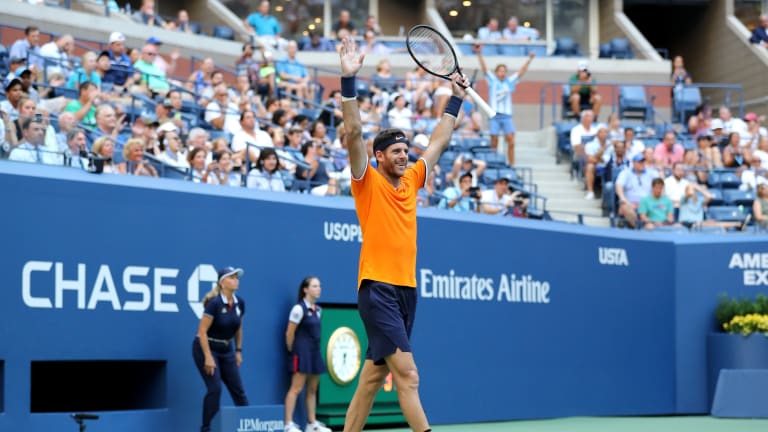 Del Potro outslugs Isner to return to the US Open semifinals