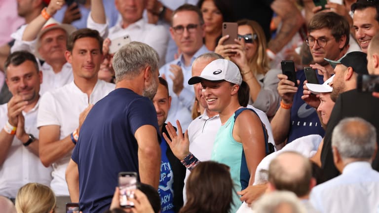 Iga Swiatek, celebrating with coach Tomasz Wiktorowski after winning her second French Open, has kept a relatively stable coaching team.