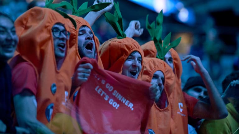 ...to the ATP Finals—and beyond—the Carota Boys, Sinner's fan club, makes their presence plainly visible.