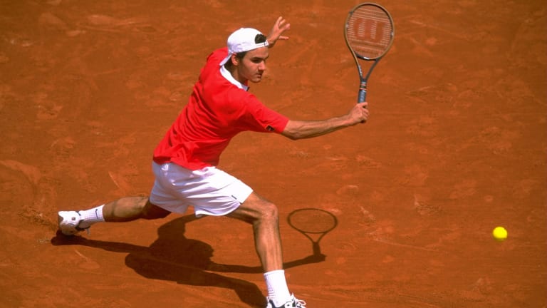 Roger Federer prepares for a backhand at the 1999 French Open.