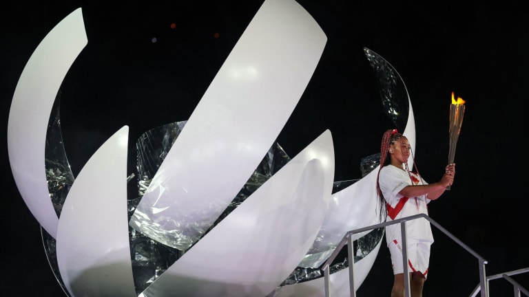 Naomi Osaka lights the Olympic cauldron at the 2020 Tokyo Games.
