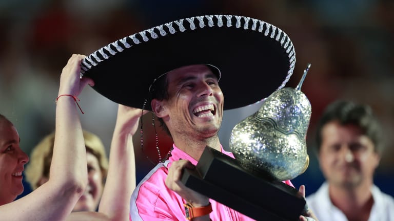 Rafael Nadal lifts the trophy in Acapulco, a favorite stop on the WTA and ATP tours.