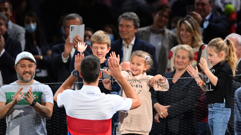 Djokovic with son Stefan (center) and daughter Tara at last year's Paris-Bercy tournament.