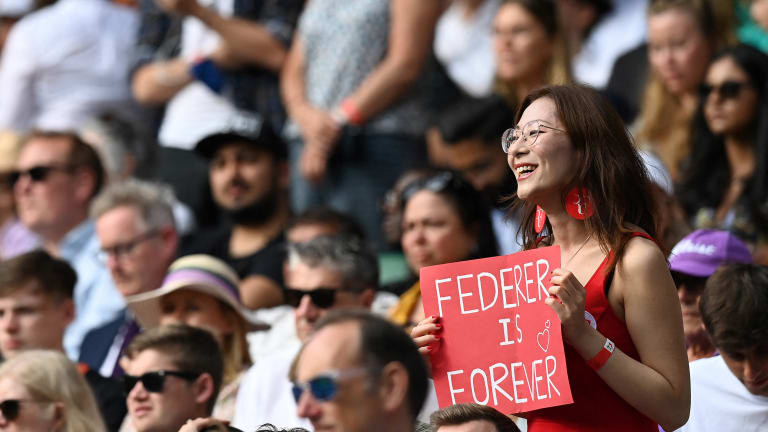 A Federer fan in the Centre Court stands during one of the 20-time major champion's matches last year.