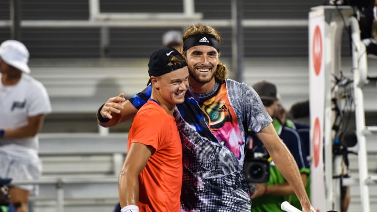 Though still just 24, the Greek is the proverbial big brother here. That said, his teenage partner has held his own, as the duo plays for a semifinal berth later Friday.