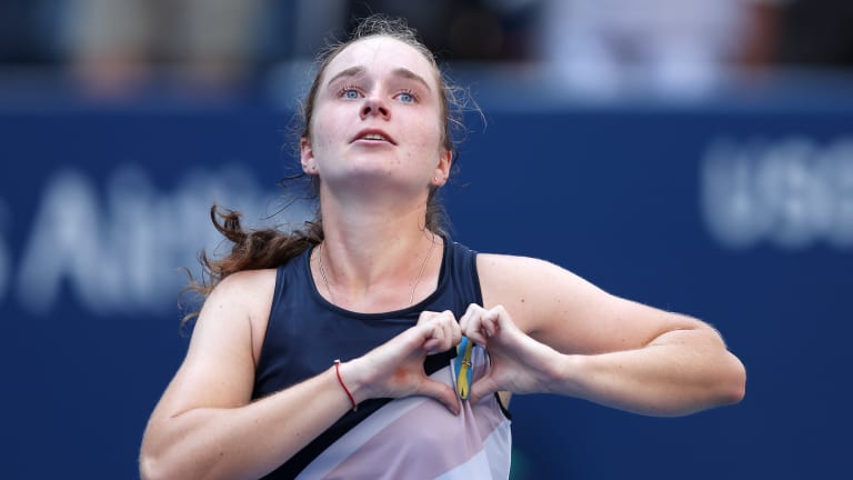 Daria Snigur earned an emotional victory over former world No. 1 Simona Halep on Louis Armstrong Stadium, where she played last week as part of Tennis Plays for Peace.