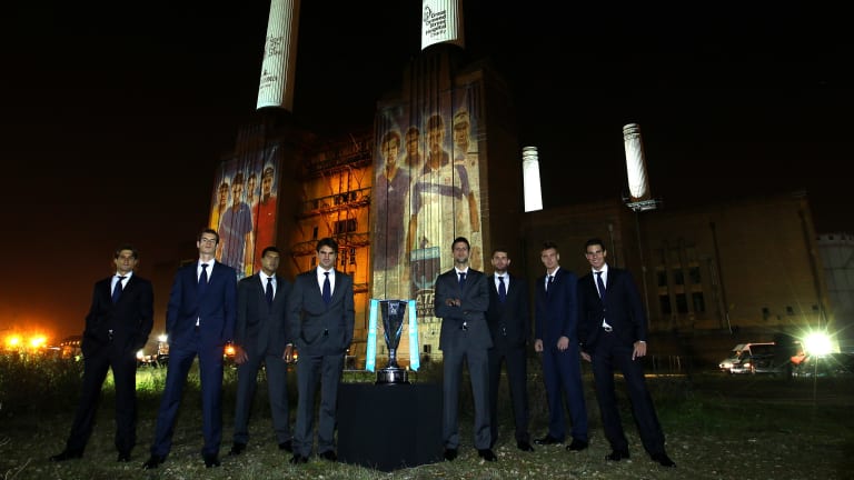 The tour's stint in London produced quite a few moody nighttime group photos, like this one in 2011 in front of the Battersea Power Station.