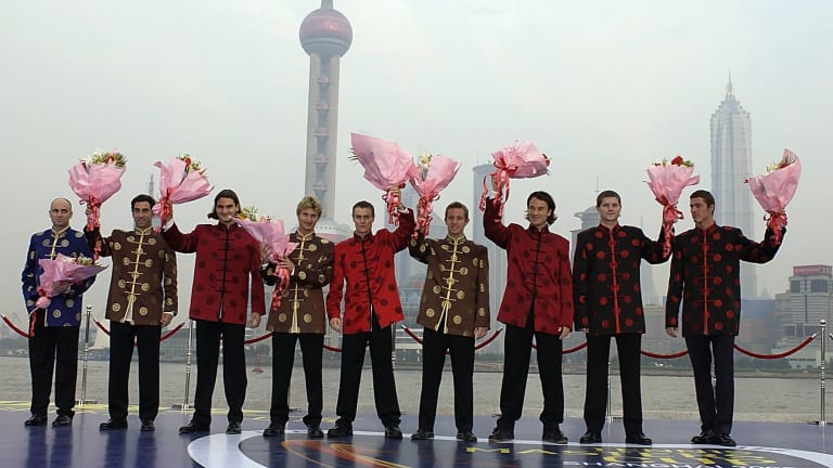 The Top 9 donned traditional Tang suit jackets to welcome the tour's first stint in Shanghai in 2002. Alternate Thomas Johansson (fourth from right) would later replace Andre Agassi (far left) in the draw due to injury.