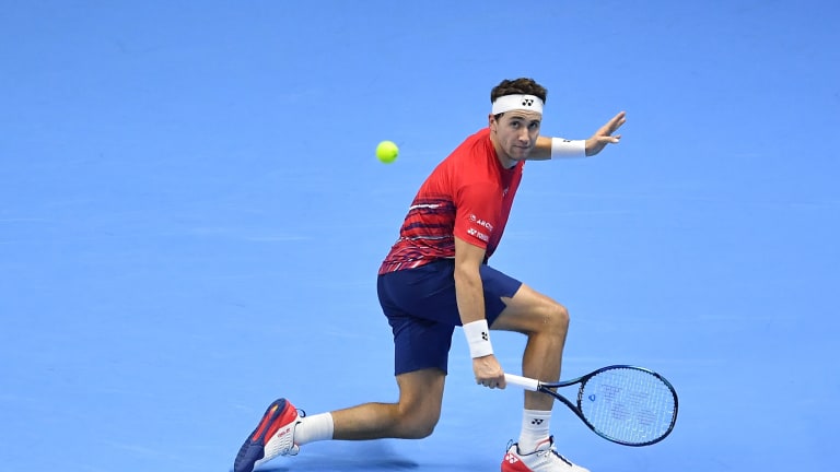 Casper Ruud played a backhand shot during the round robin match between Rafael Nadal during day five of the ATP Finals.