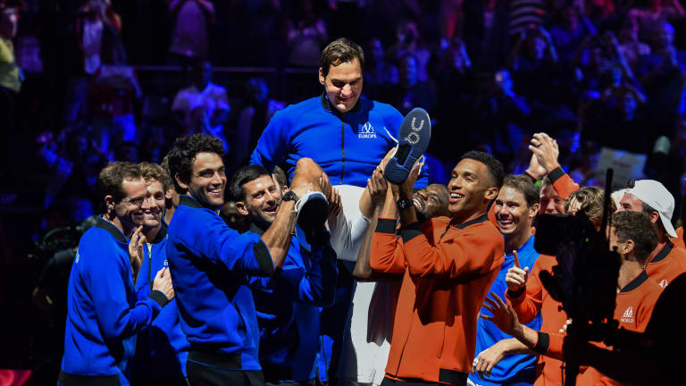 After Federer took a victory lap around the venue, his peers joined together to lift the 20-time major champion.
