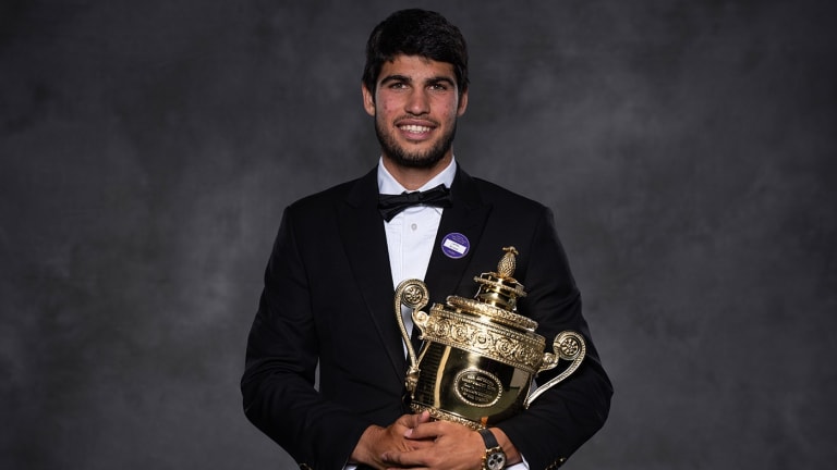 Hours after the final, Louis Vuitton and Rolex ambassador Alcaraz was dressed to the nines for his champion's portrait.