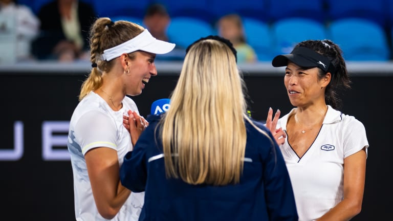 Hsieh and Elise Mertens share a laugh after their semifinal doubles win.