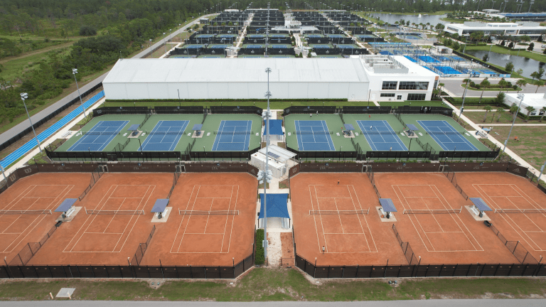 Six red-clay courts provide pros access to an uncommon playing surface in the U.S.