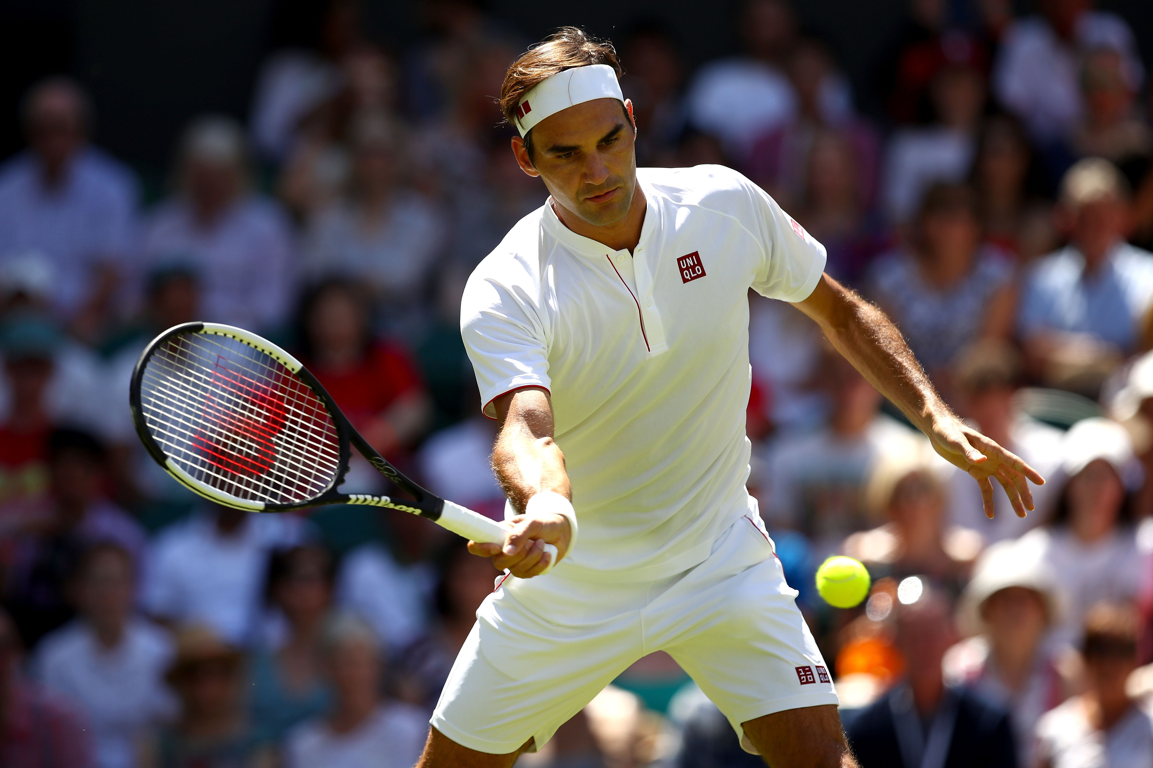 Federer's new clothes: At Wimbledon, Roger ditches Nike for Uniqlo