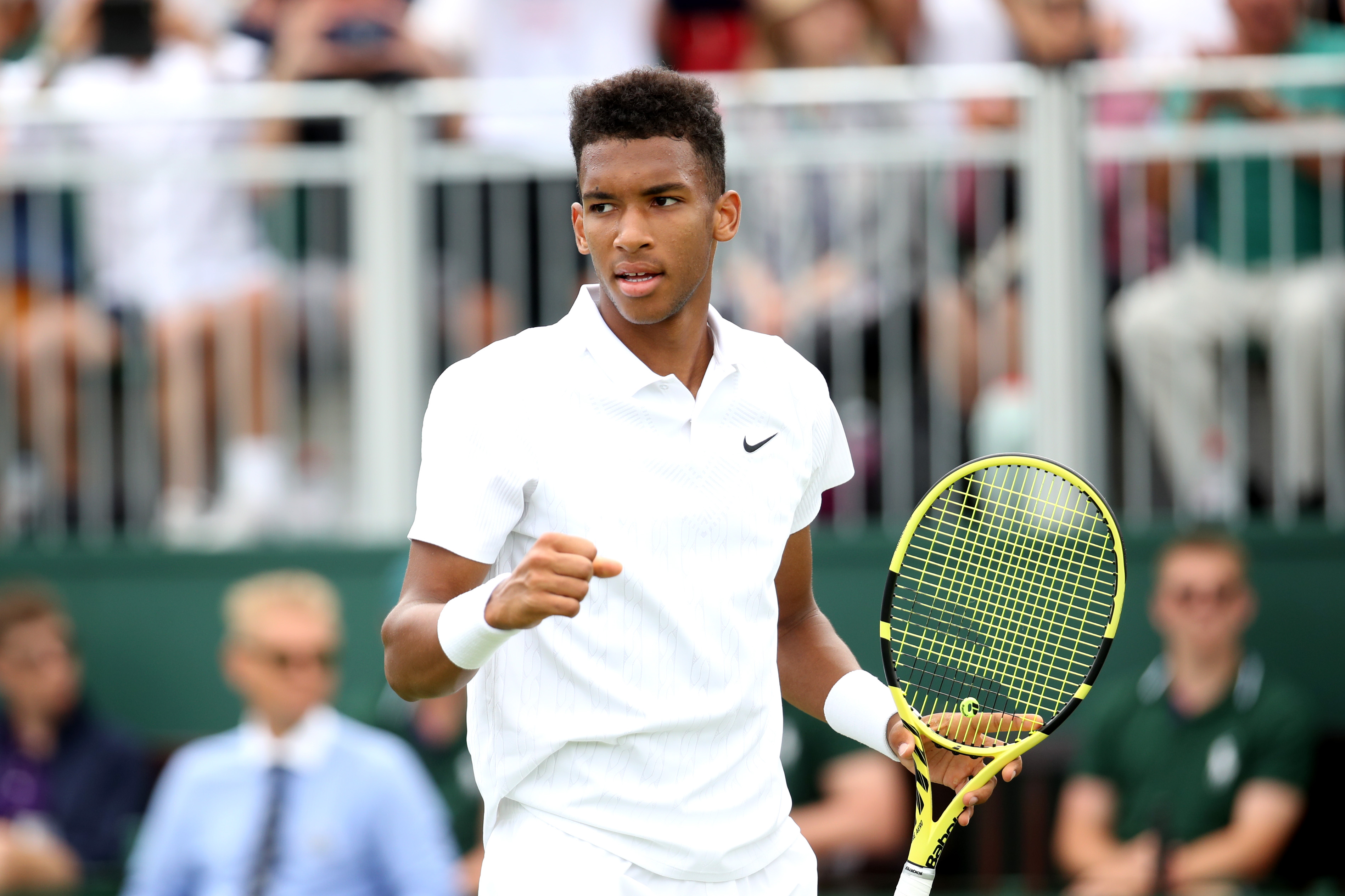 Auger-Aliassime—co-6th favorite to win Wimbledon—wins first Slam match
