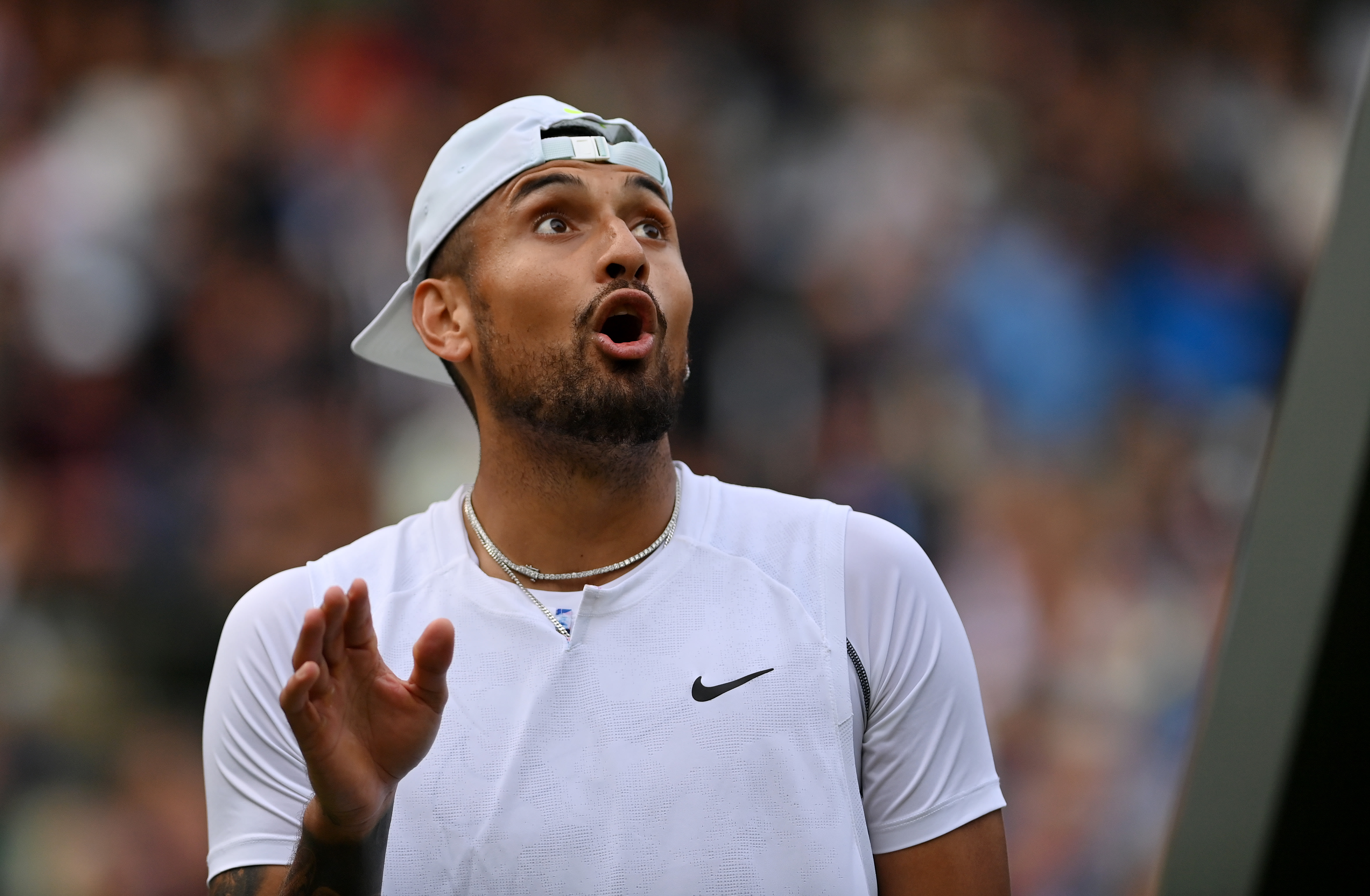 Nick Kyrgios calls for Stefanos Tsitsipas default after Greek nearly hits person with ball—then prevails in chaotic Wimbledon classic