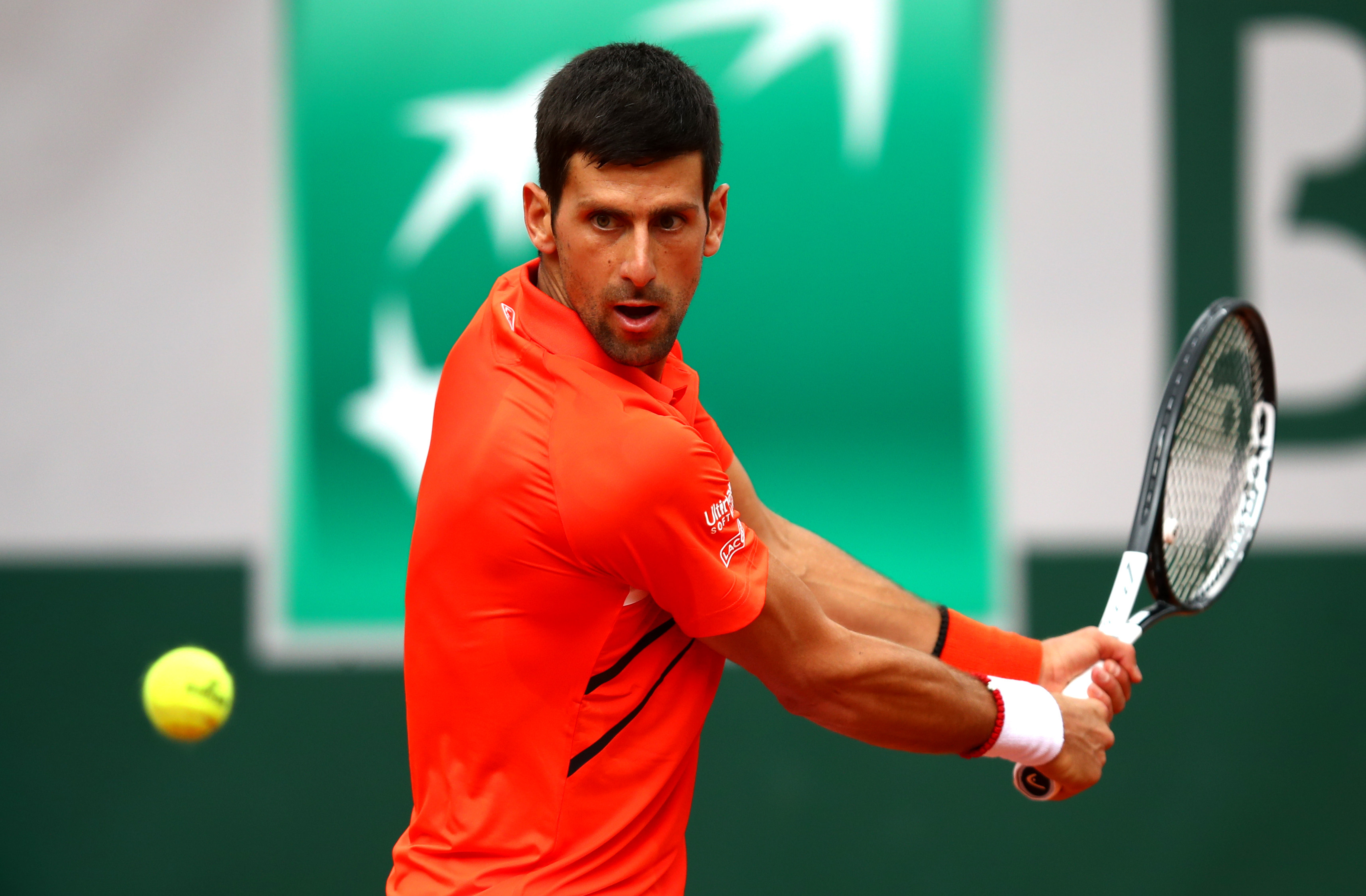 Djokovic becomes first man to make straight 10 French Open quarters