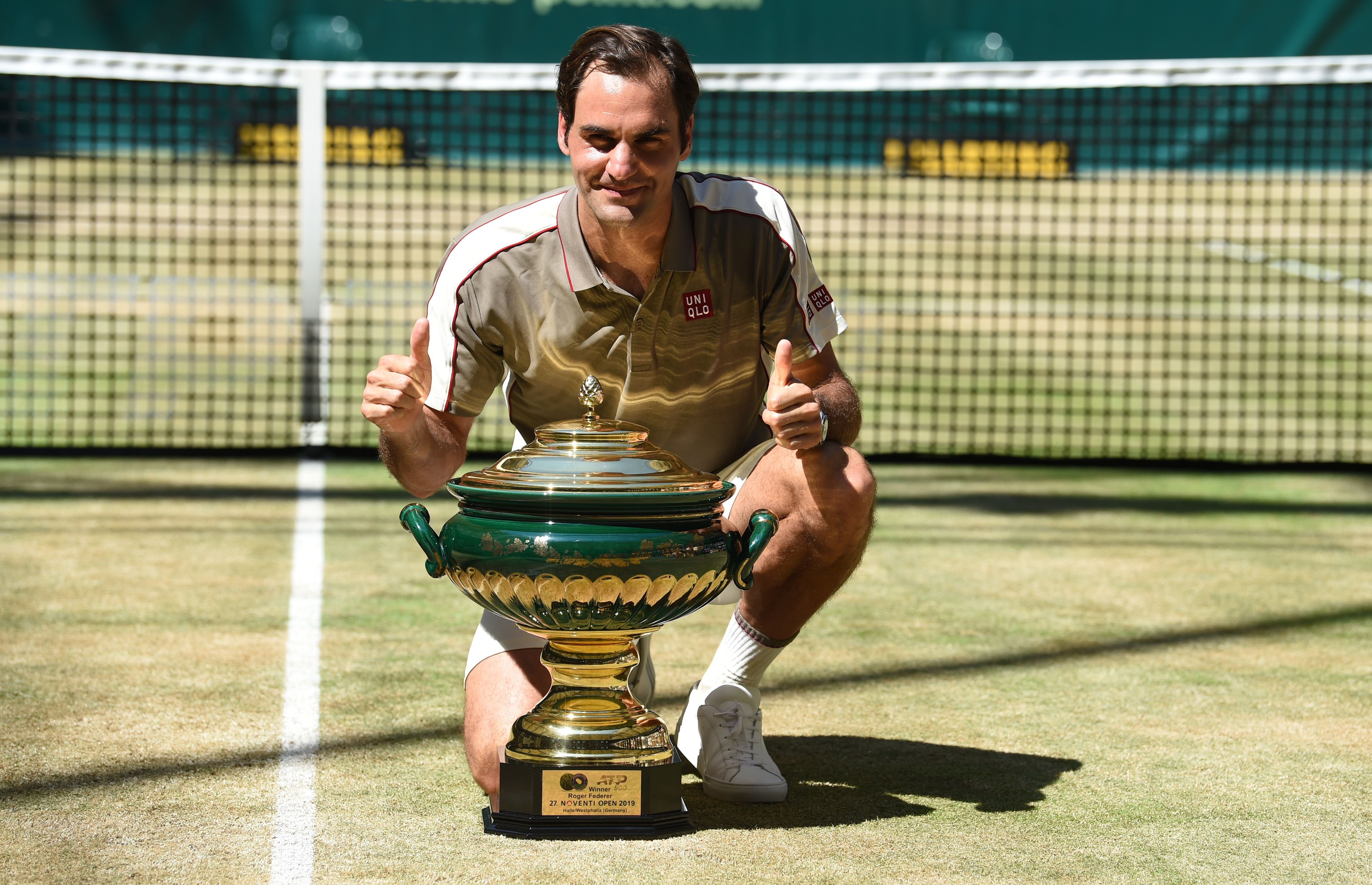 Federer achieves new milestone in winning 10th Halle title over Goffin