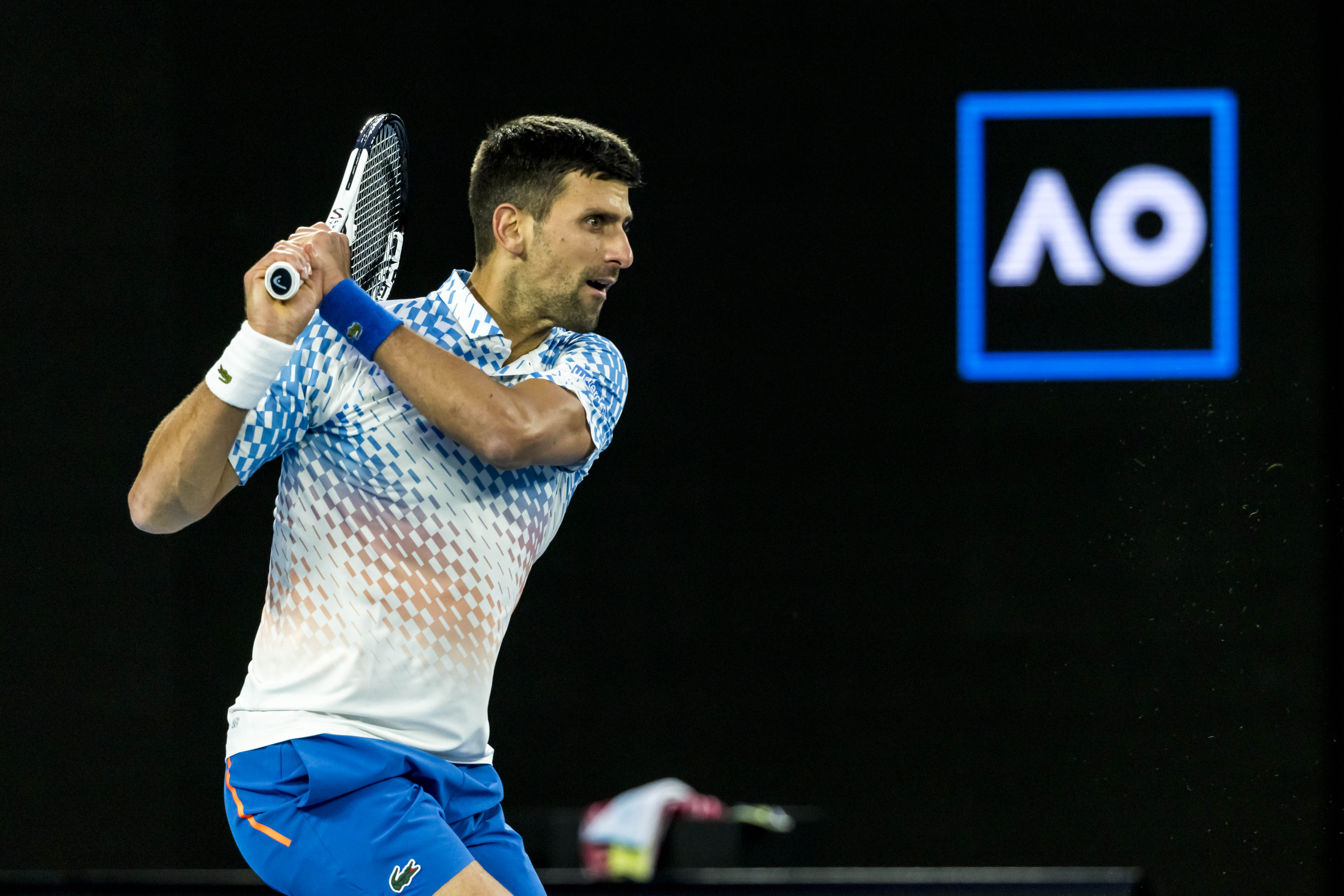 Novak Djokovic extends Australian Open winning streak to 23 matches after stopping qualifier Couacaud