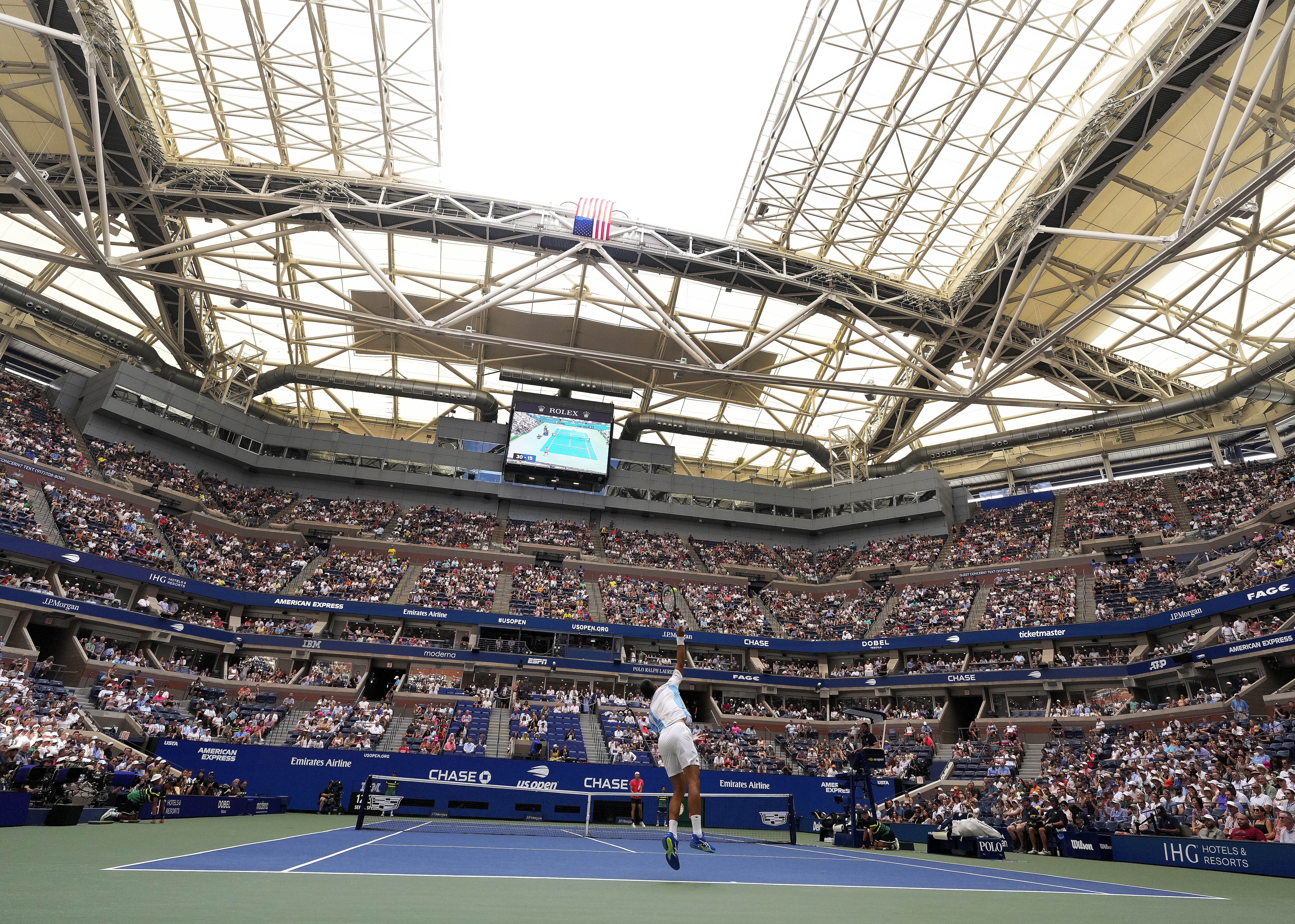 Two roofs at the US Open were partially shut because of rising heat and humidity