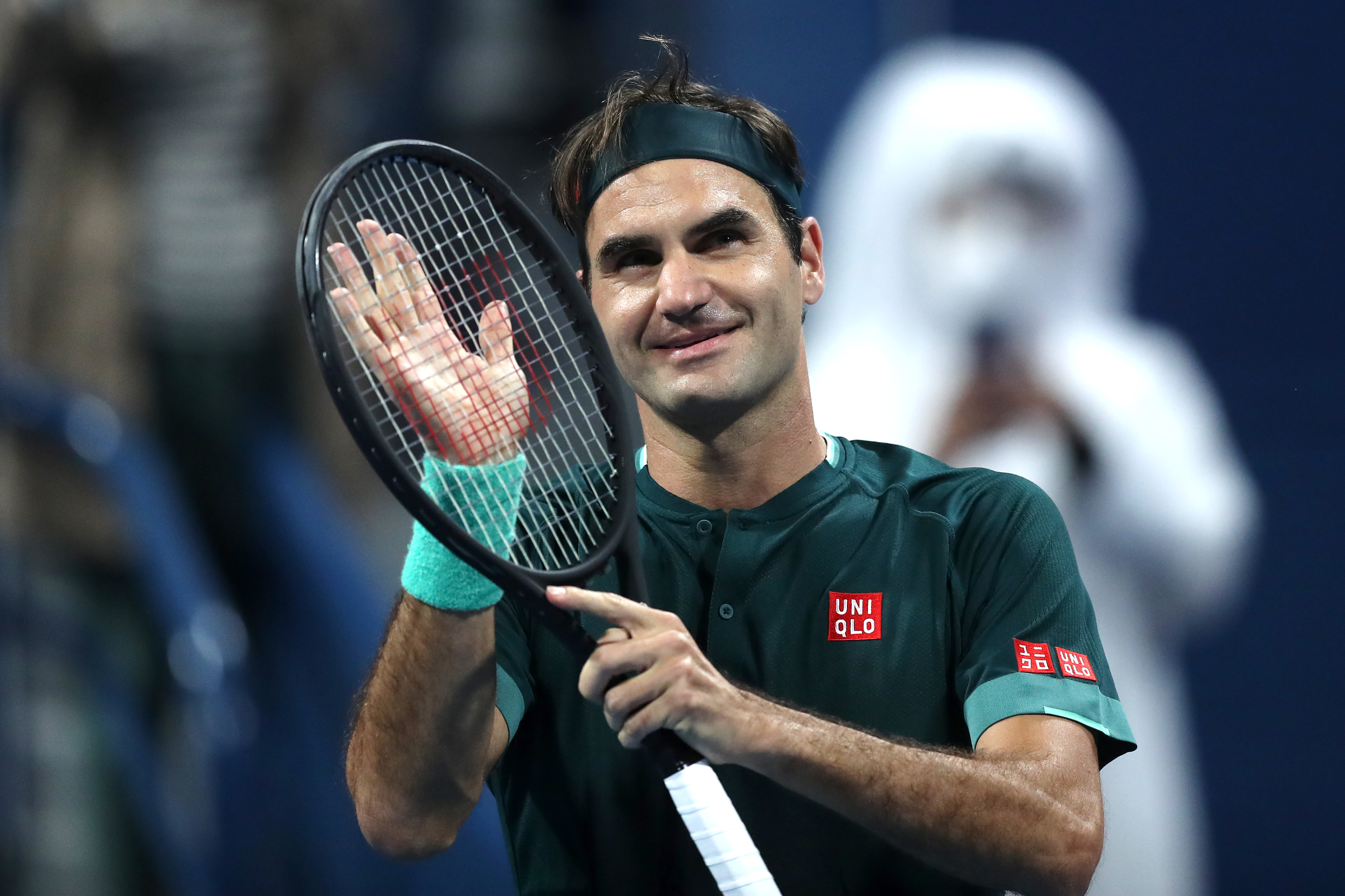 Roger Federer wins first match in 14 months, beating Dan Evans in Doha
