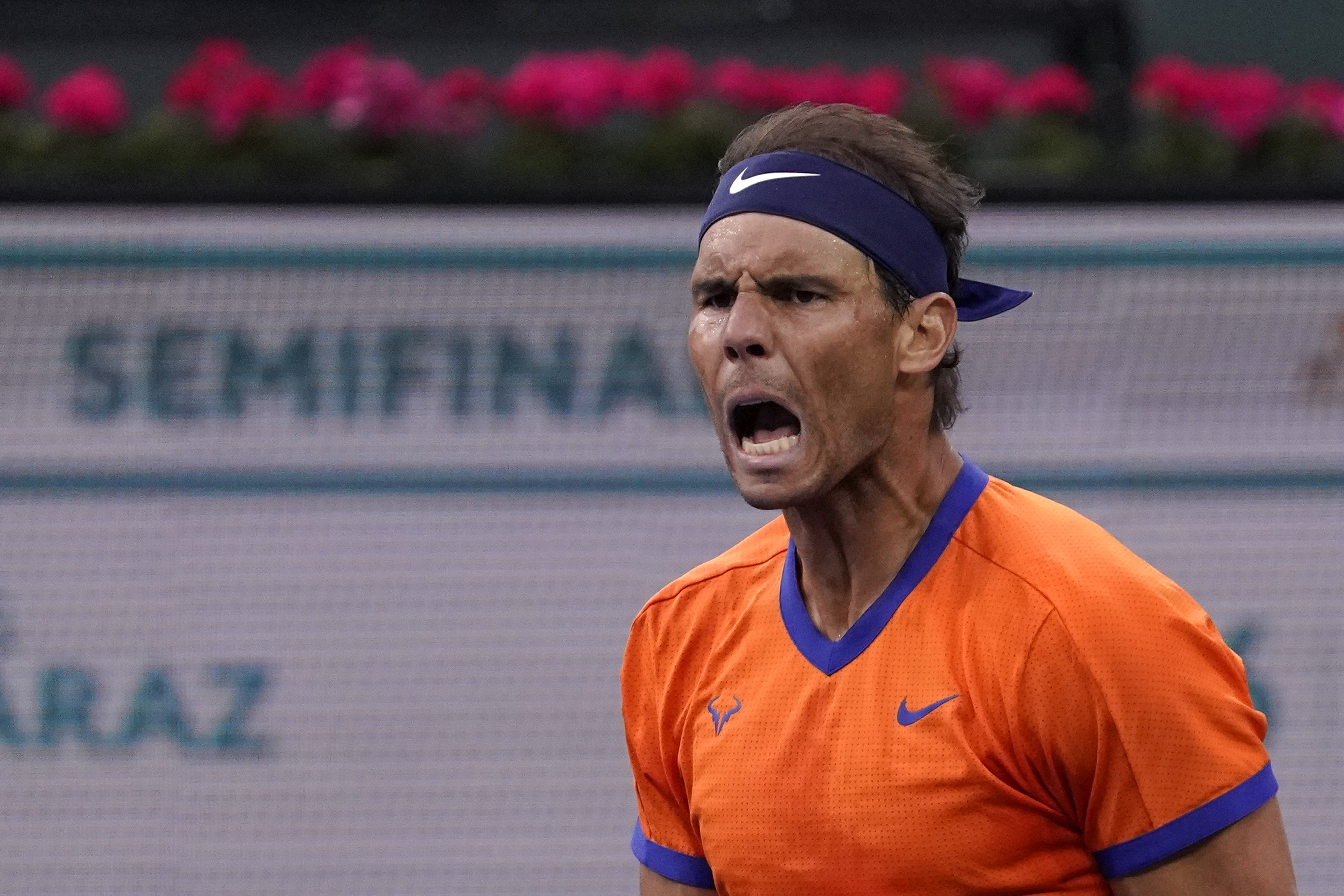 Rafael Nadal survives Carlos Alcaraz and swirling wind over three-plus hours in moving to 20-0 on the year